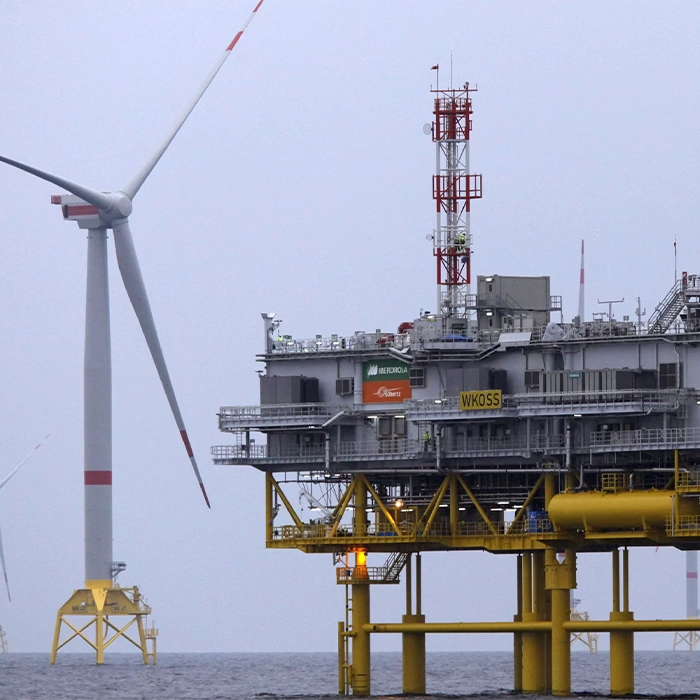 Wind turbines in operation, generating renewable energy from wind power